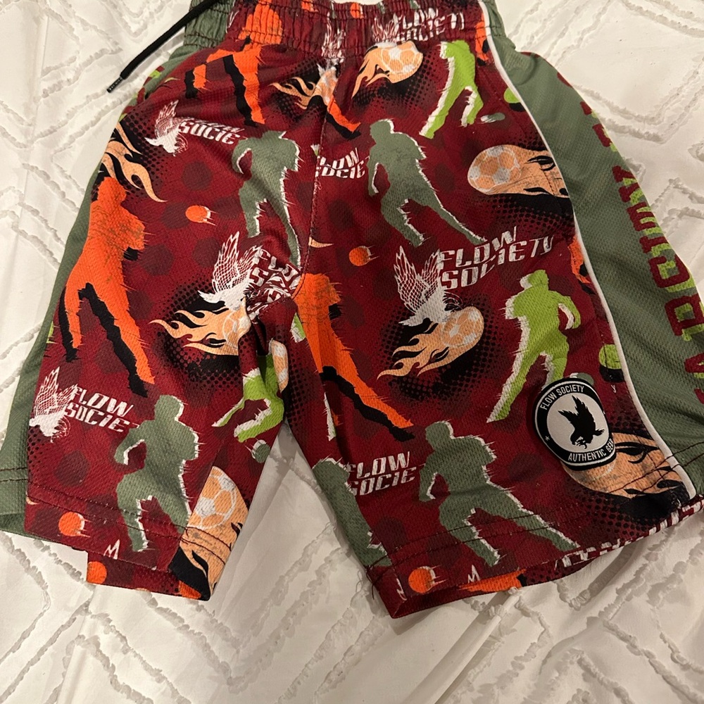 Flow society shorts youth XS.  Varsity flow.  Soccer shorts